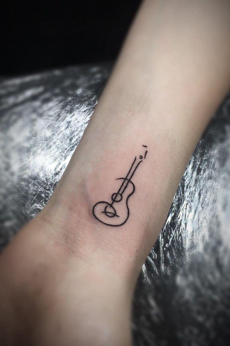 xăm đàn guitar tattoo guitar xăm hình phong cách watercolor hình xăm  đẹp xăm hình nghệ thuật tại tungtatto  Guitar tattoo design Music  tattoos Guitar tattoo