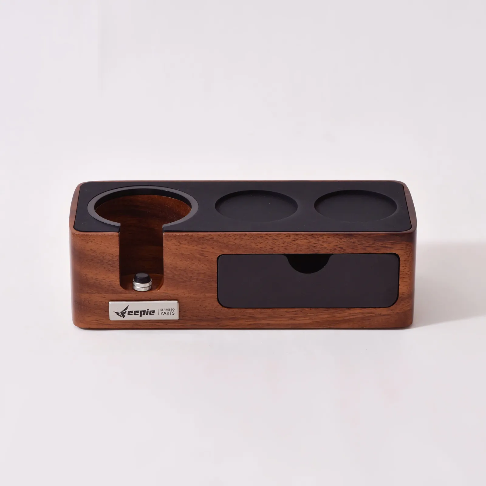 Đế nén cà phê Feepie trên nền trắng, thấy logo Feepie Espresso Parts và ngăn kéo