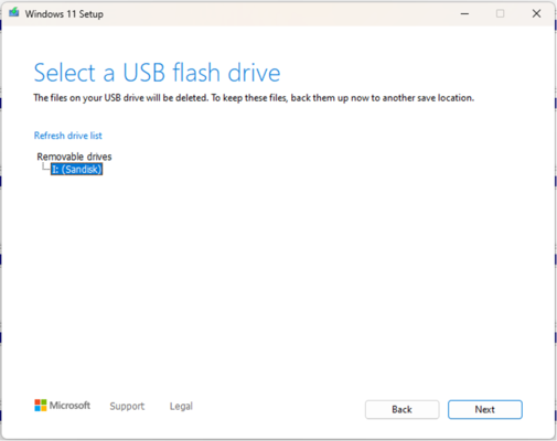 Chọn USB cài Windows → Next