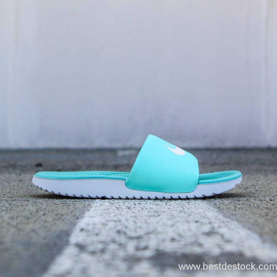 mint green nike slides