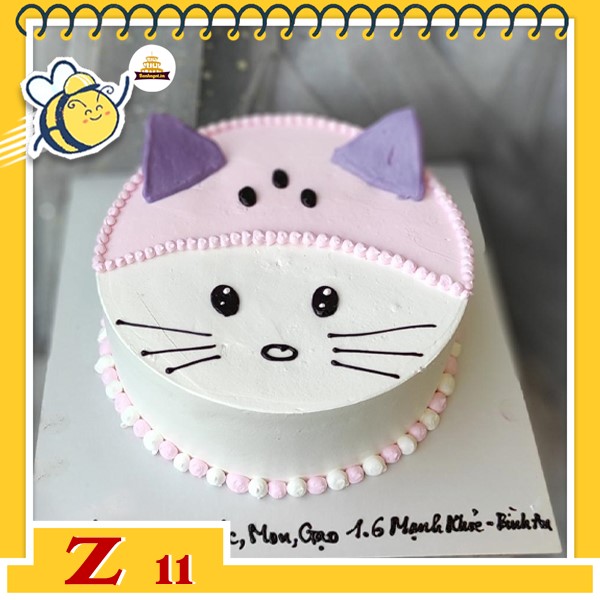 Bánh kem mặt cười Z11 mặt mèo đầu màu hồng có 2 tai màu tím ngộ nghĩnh đáng yêu