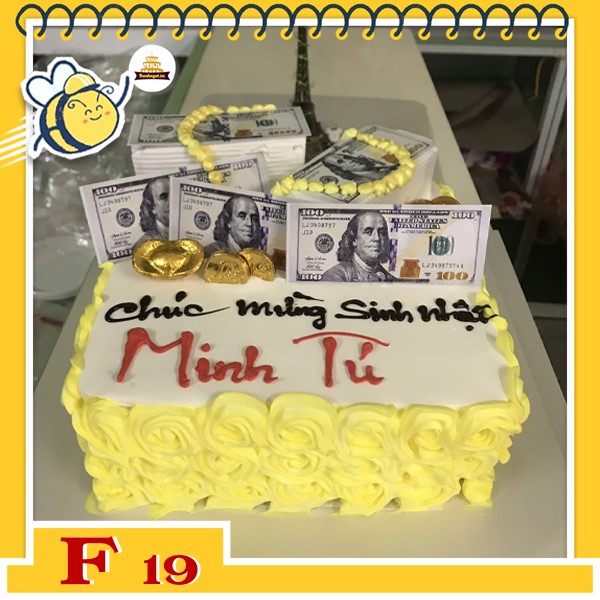 Bánh kem vuông F19 nền trắng viền vàng cắm đô la vàng bạc giàu sang
