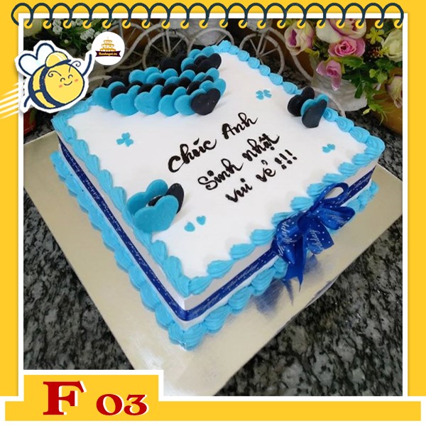 Bánh kem vuông F03 nền trắng viền xanh dương thắt nơ xanh cắm trái tim socola xanh dương tươi mát
