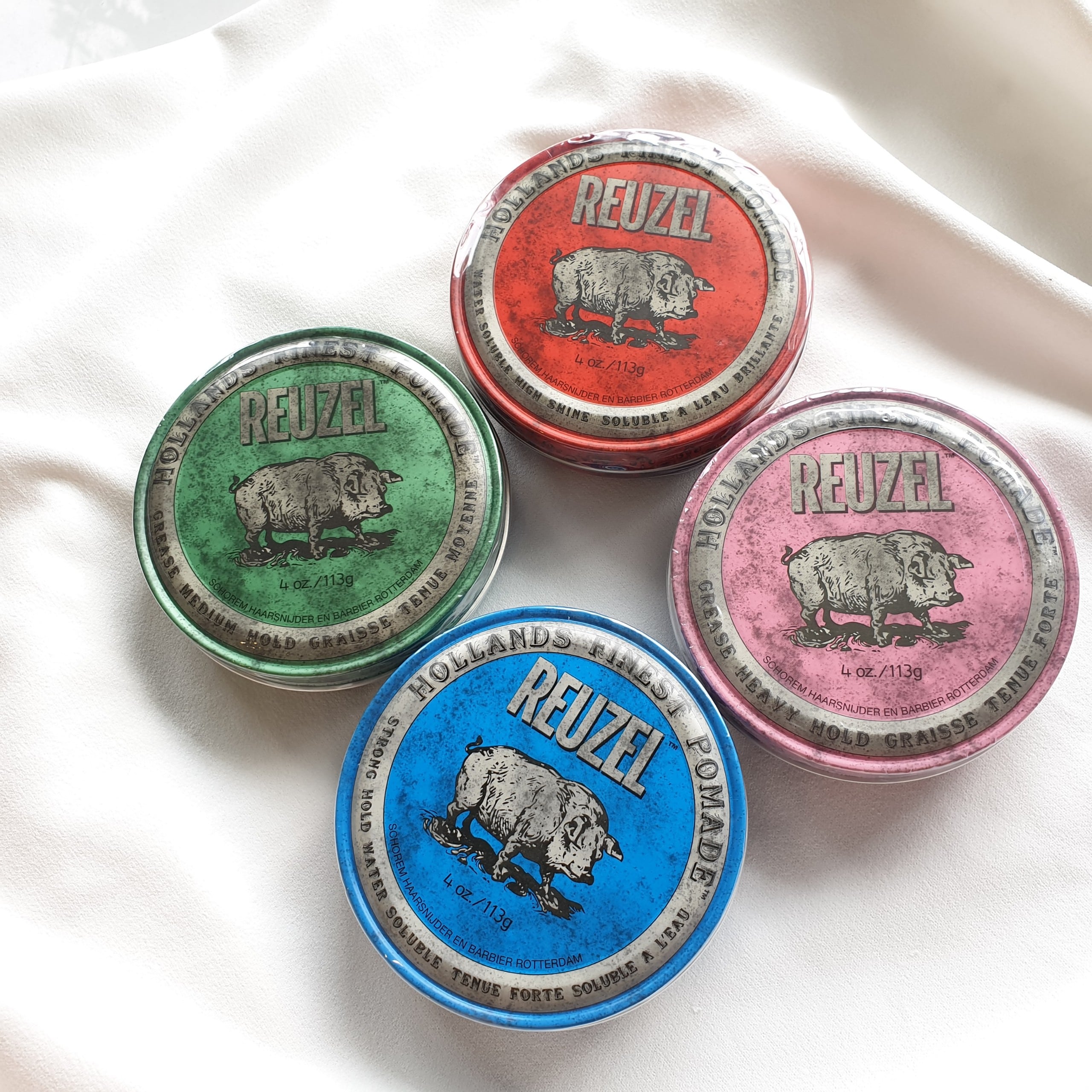 Reuzel Pomade - Sáp vuốt tóc nam.