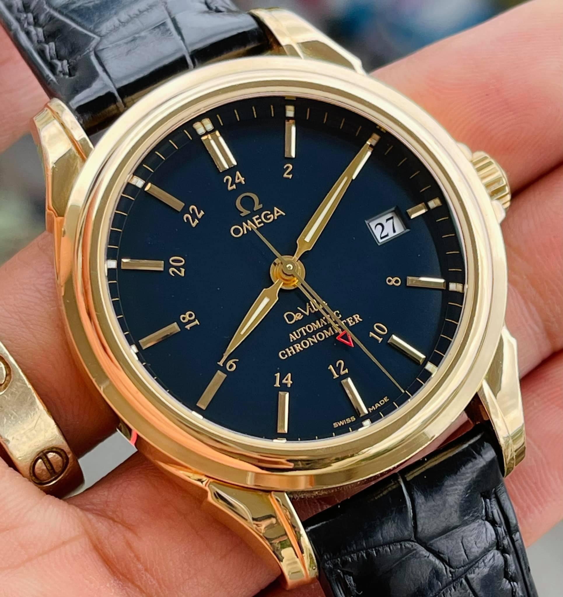 dong-ho-omega-deville-18k-gold-blue-dial-co-axial-chronometer-38-7mm-gmt