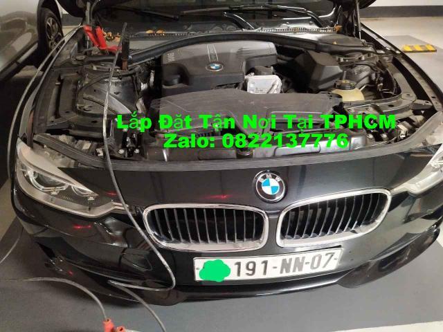 thay bình ắc quy xe bmw 320i chính hãng
