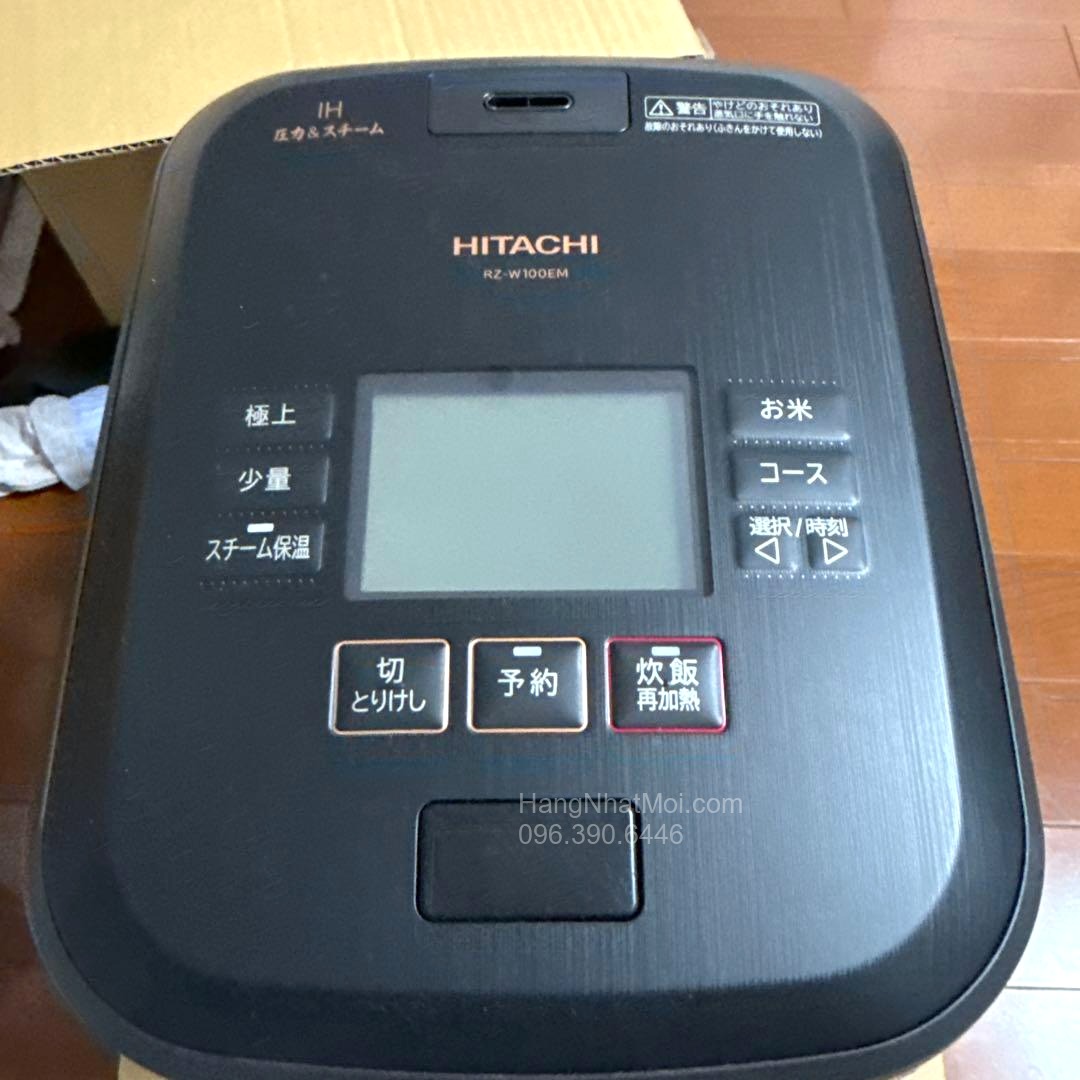 Mặt trên RZ-W100EM với màn hình LCD và nút chọn chế độ.