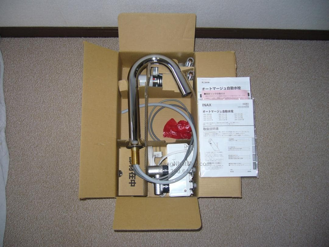 INAX AM-313TCV1-MB – Bộ cổ cong, cụm điều khiển AC100V và thermostat trong hộp tham khảo.