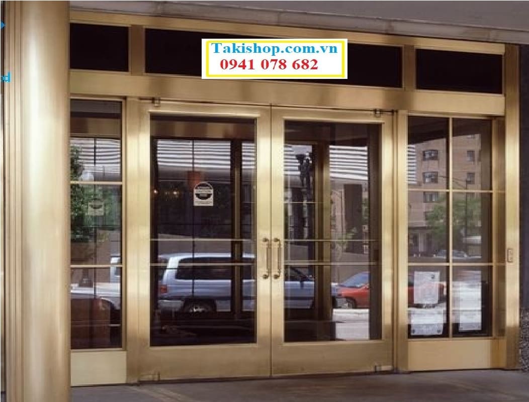 Cung cấp cửa kính inox vàng gương cho mặt tiền nhà văn phòng đẹp