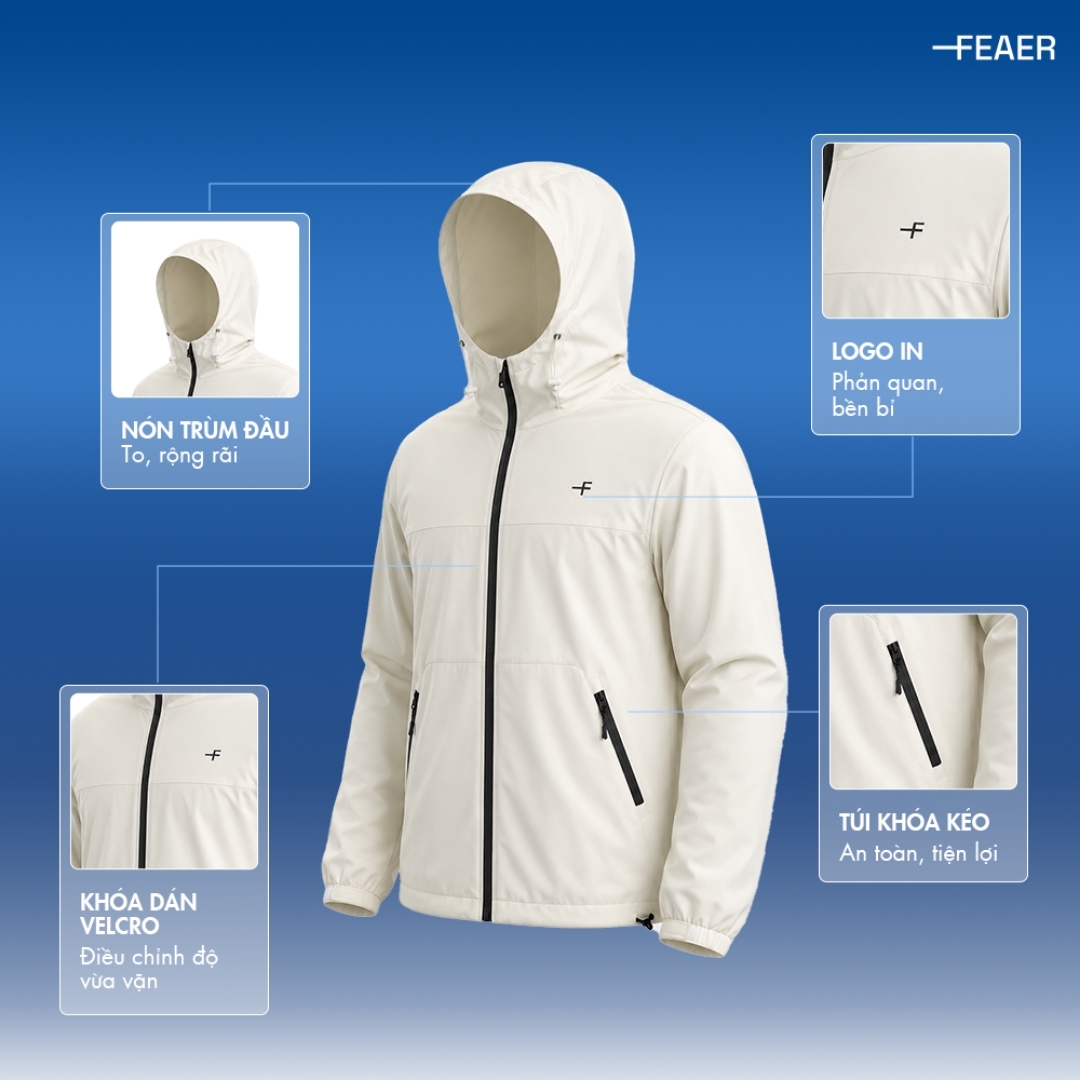 Chi tiết nổi bật áo khoác Anorak FEAER: nón trùm đầu, logo phản quang, túi khóa kéo, khóa dán velcro