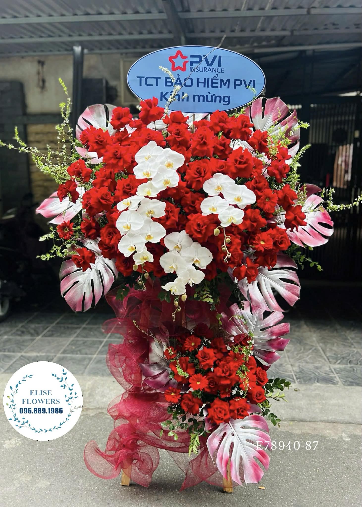 Đặt mua hoa khai trương Hà Nội. Kệ hoa chúc mừng tone đỏ cao cấp, sang trọng. Eliseflowers