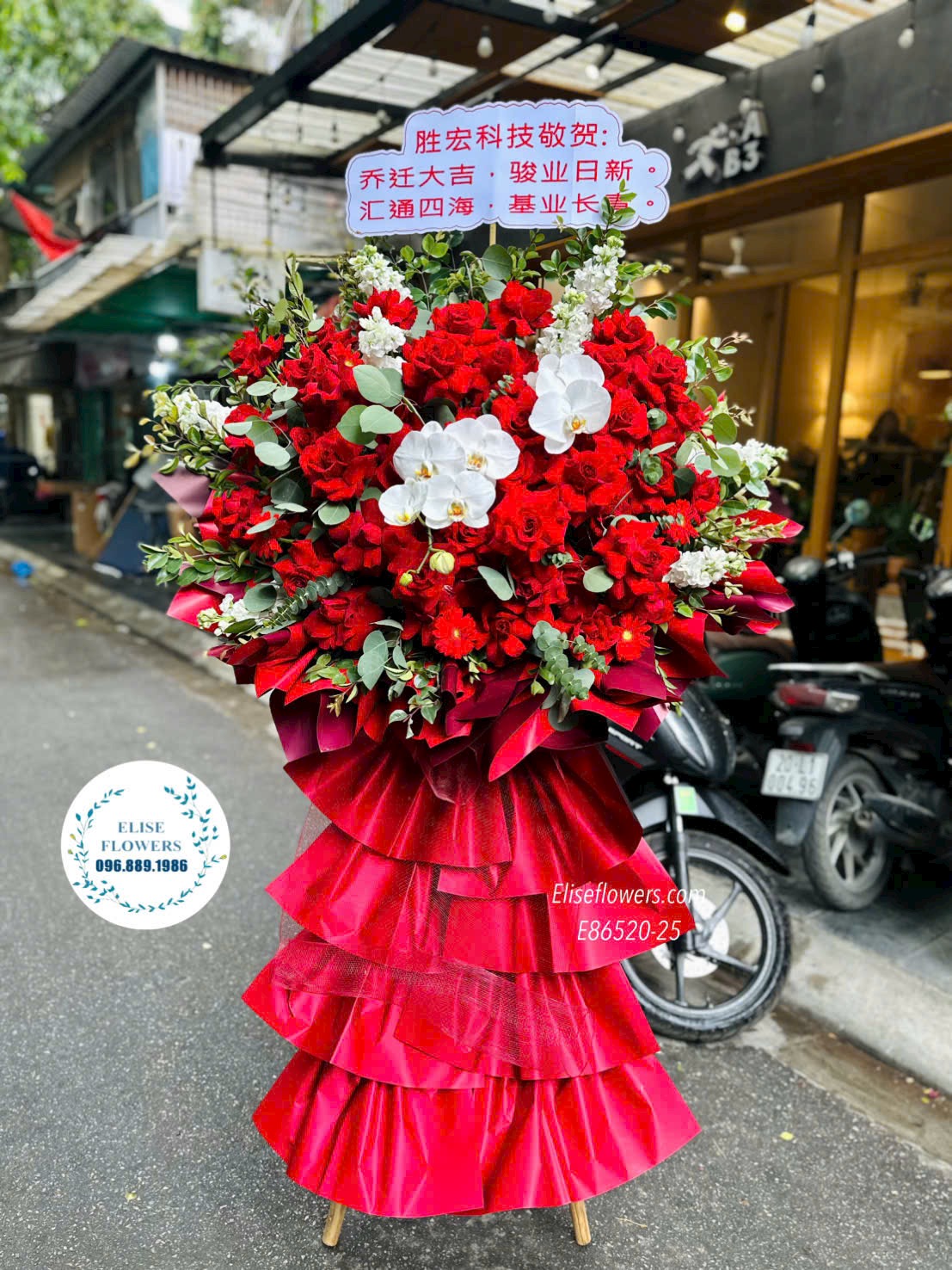 Kệ hoa tone đỏ rực rỡ. Hoa chúc mừng sinh nhật công ty, khai trương. Điện hoa uy tín Eliseflowers