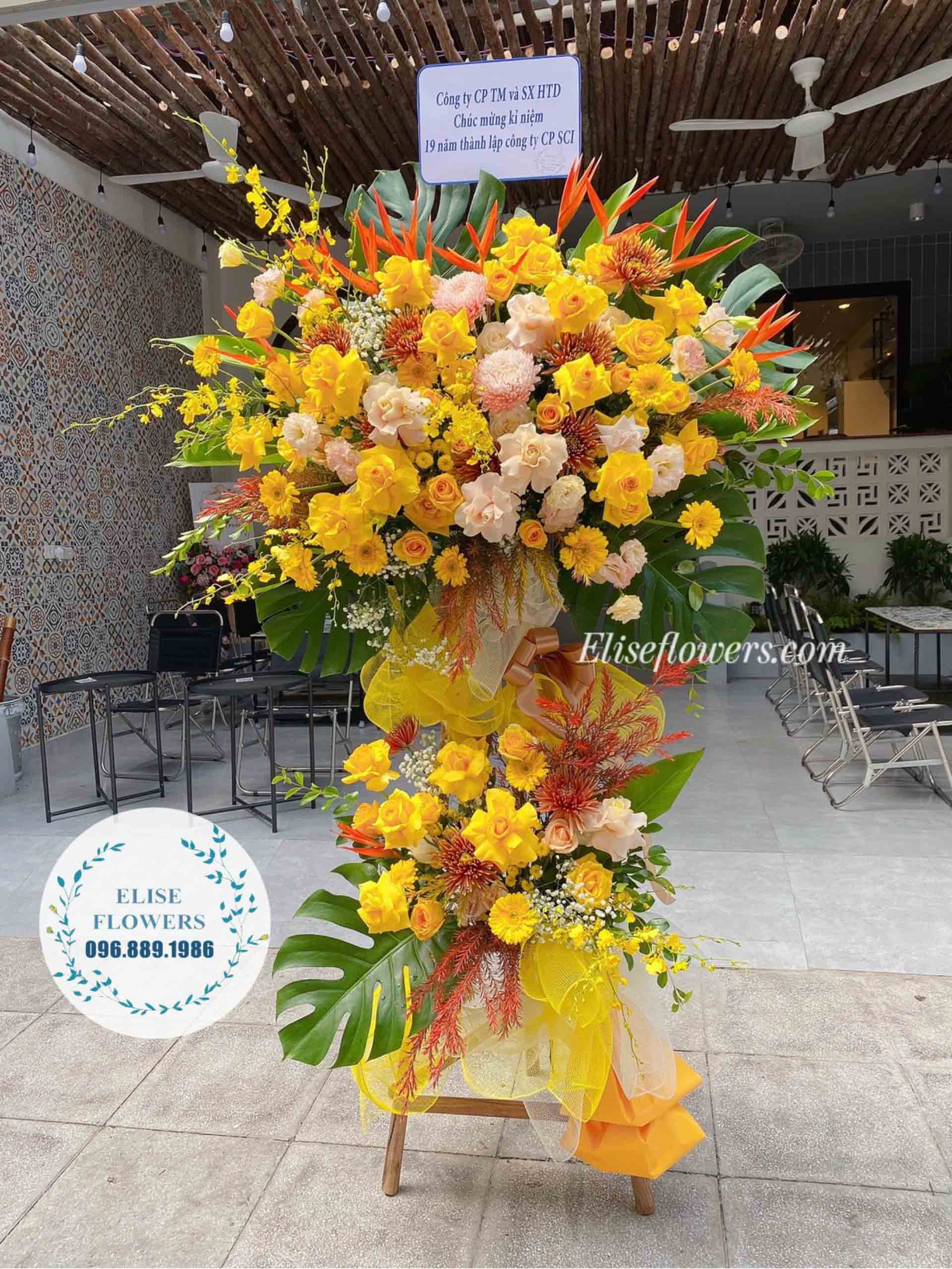 Kệ hoa màu vàng chúc mừng sự kiện công ty | Eliseflowers.com