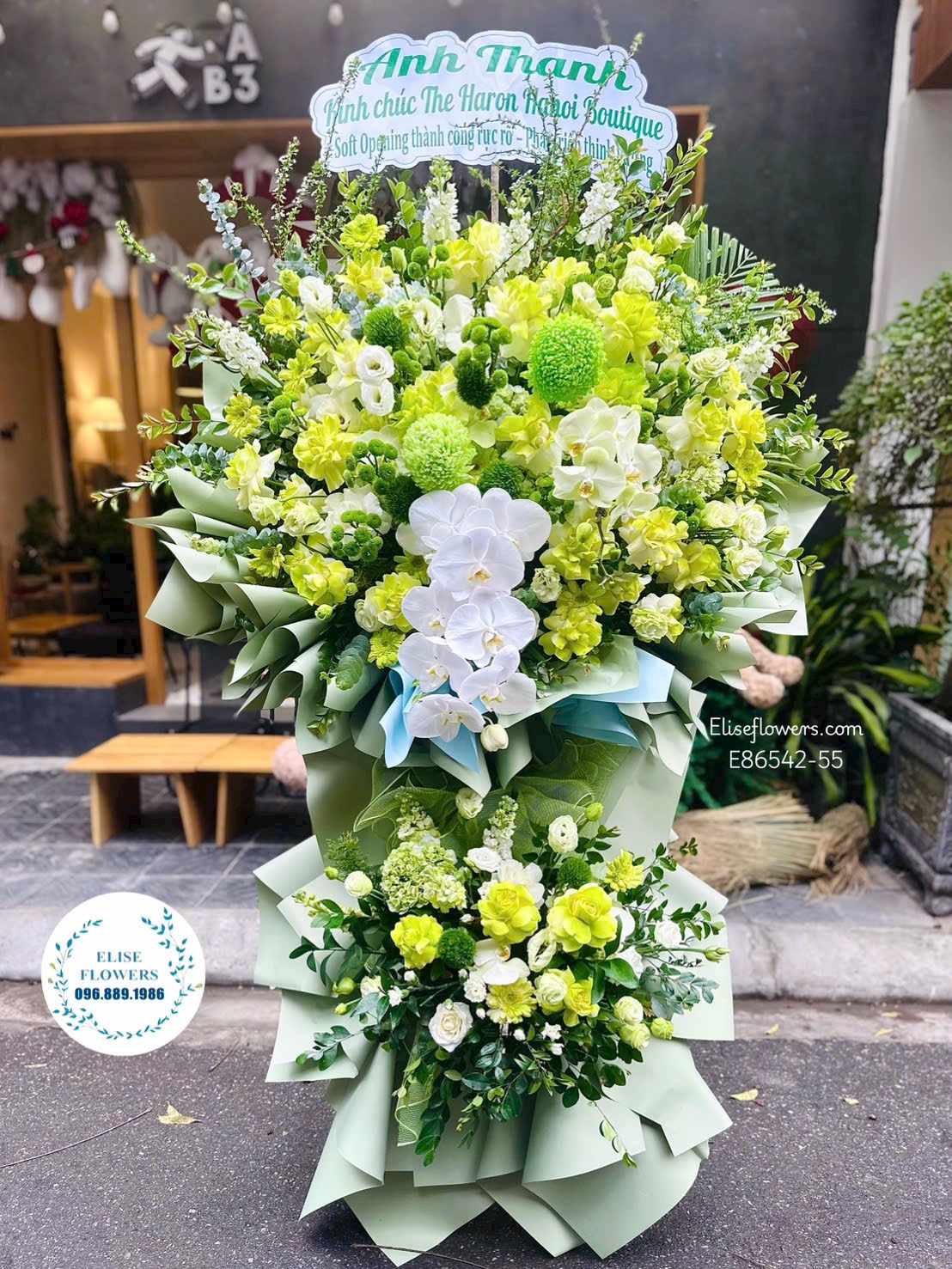 Hoa khai trương. Kệ hoa khai trương tone xanh lá cao cấp, thịnh vượng. Địa chỉ mua hoa uy tín Hà Nội