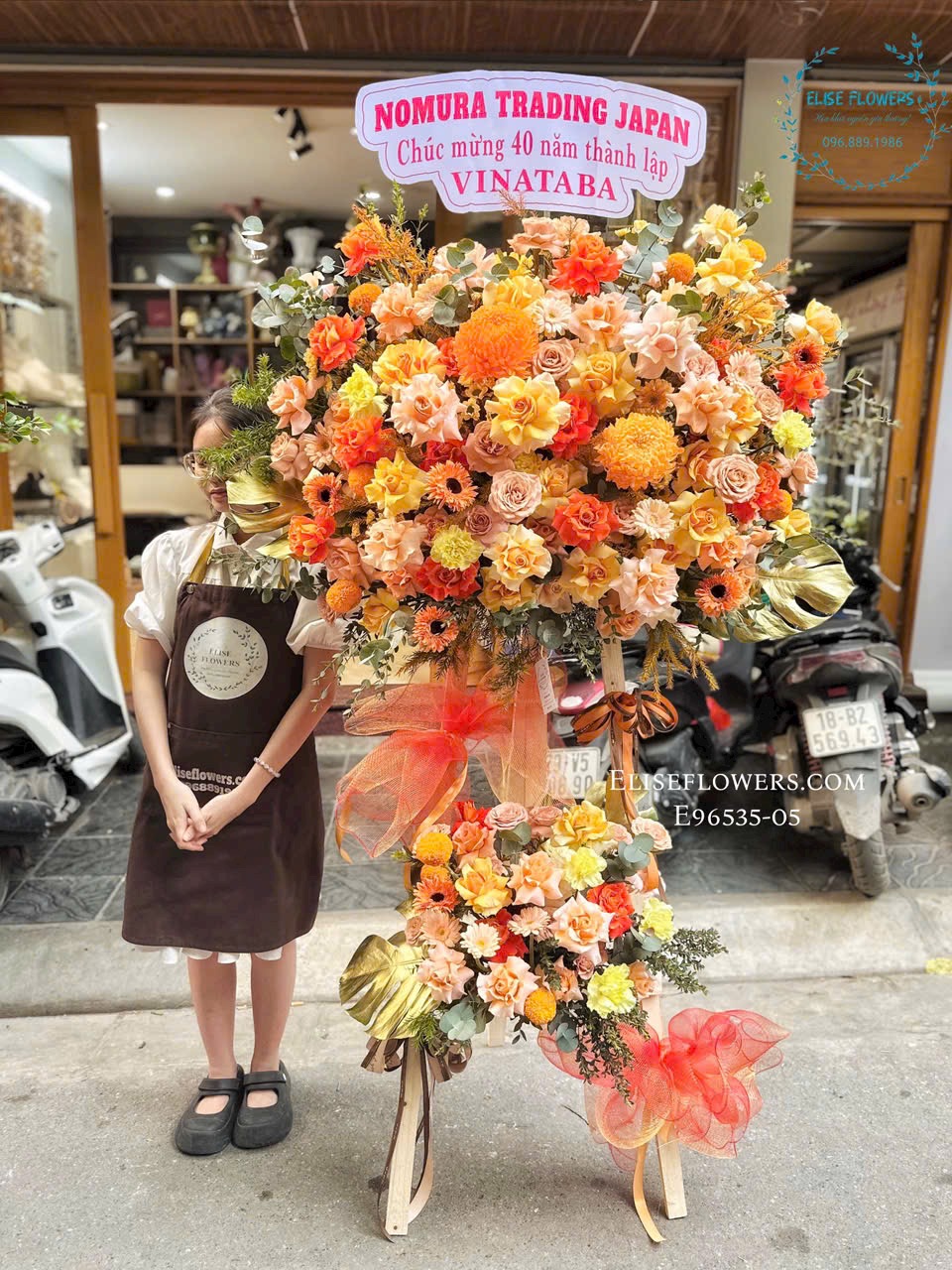 Kệ khai trương đẹp tone cam cao cấp ở Đống Đa. Điện hoa Eliseflowers.