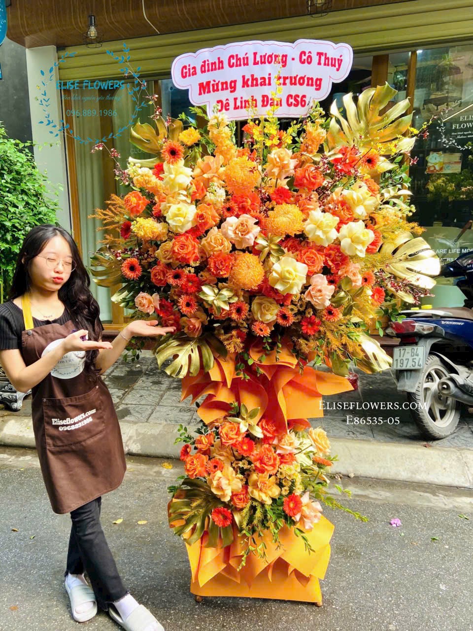 Kệ khai trương tài lộc. Điện hoa khai trương Hà Nội.