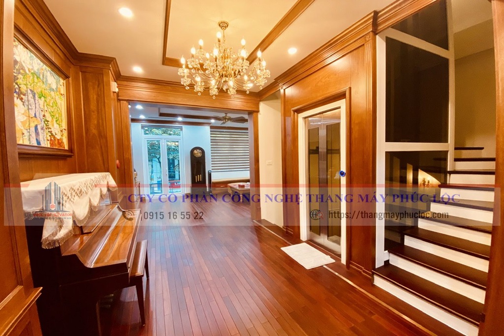 THANG MÁY GIA ĐÌNH 350KG KHUNG NHÔM HỢP KIM ỐP GỖ MẶT TRƯỚC