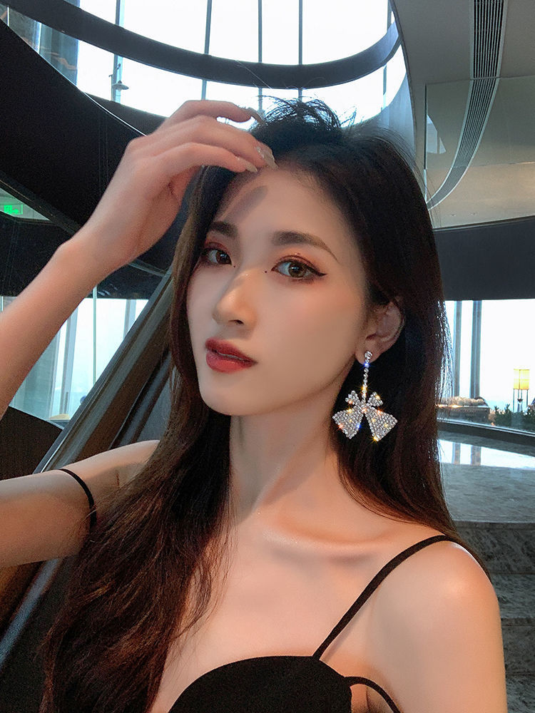 Khuyên tai bạc hình cánh quạt