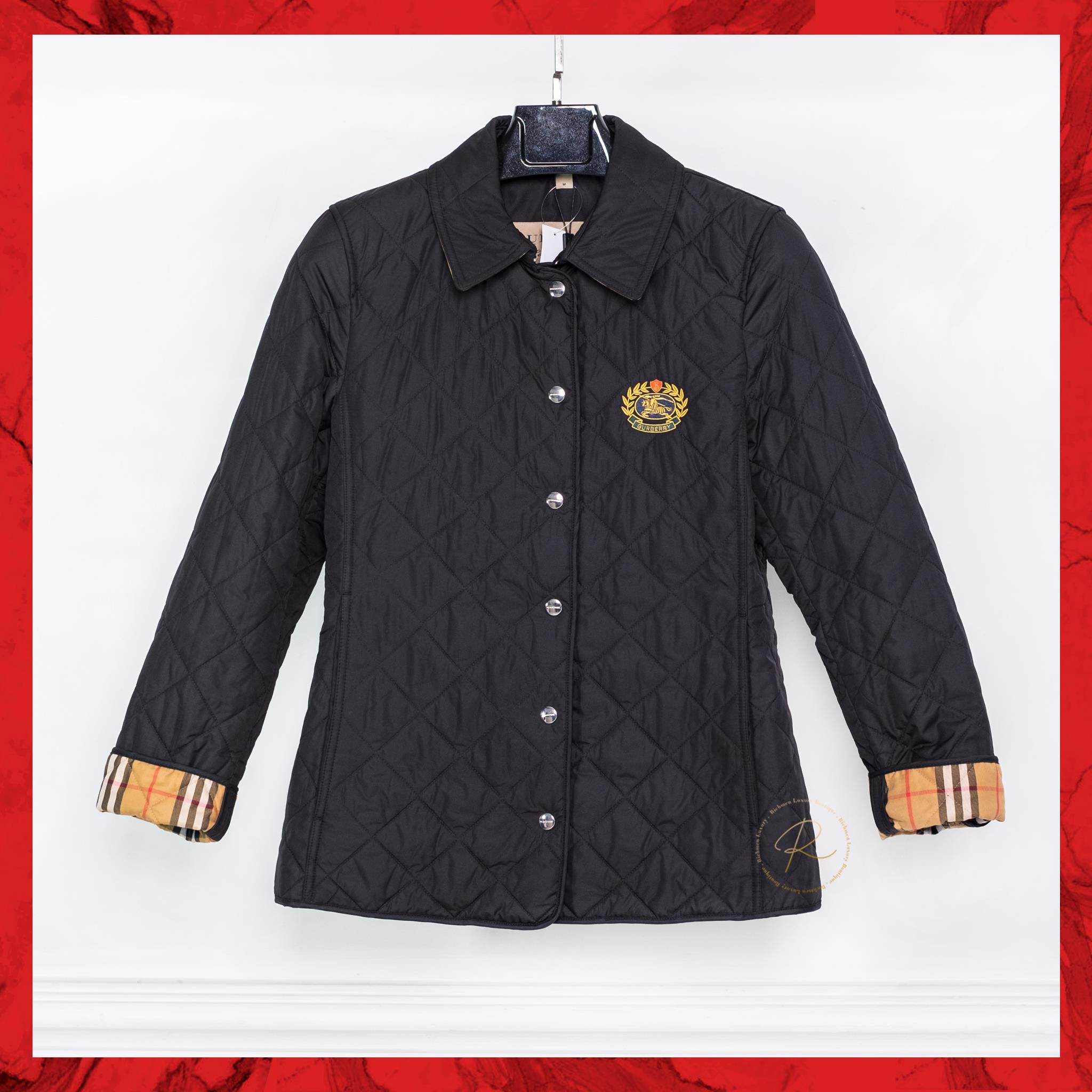 embroidered crest diamond quilted jacket