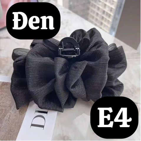 pvn68323-kep-toc-nu-ban-lon-cang-cua-no-voan-bong-bong-giu-toc-gon-tao-kieu-thoi
