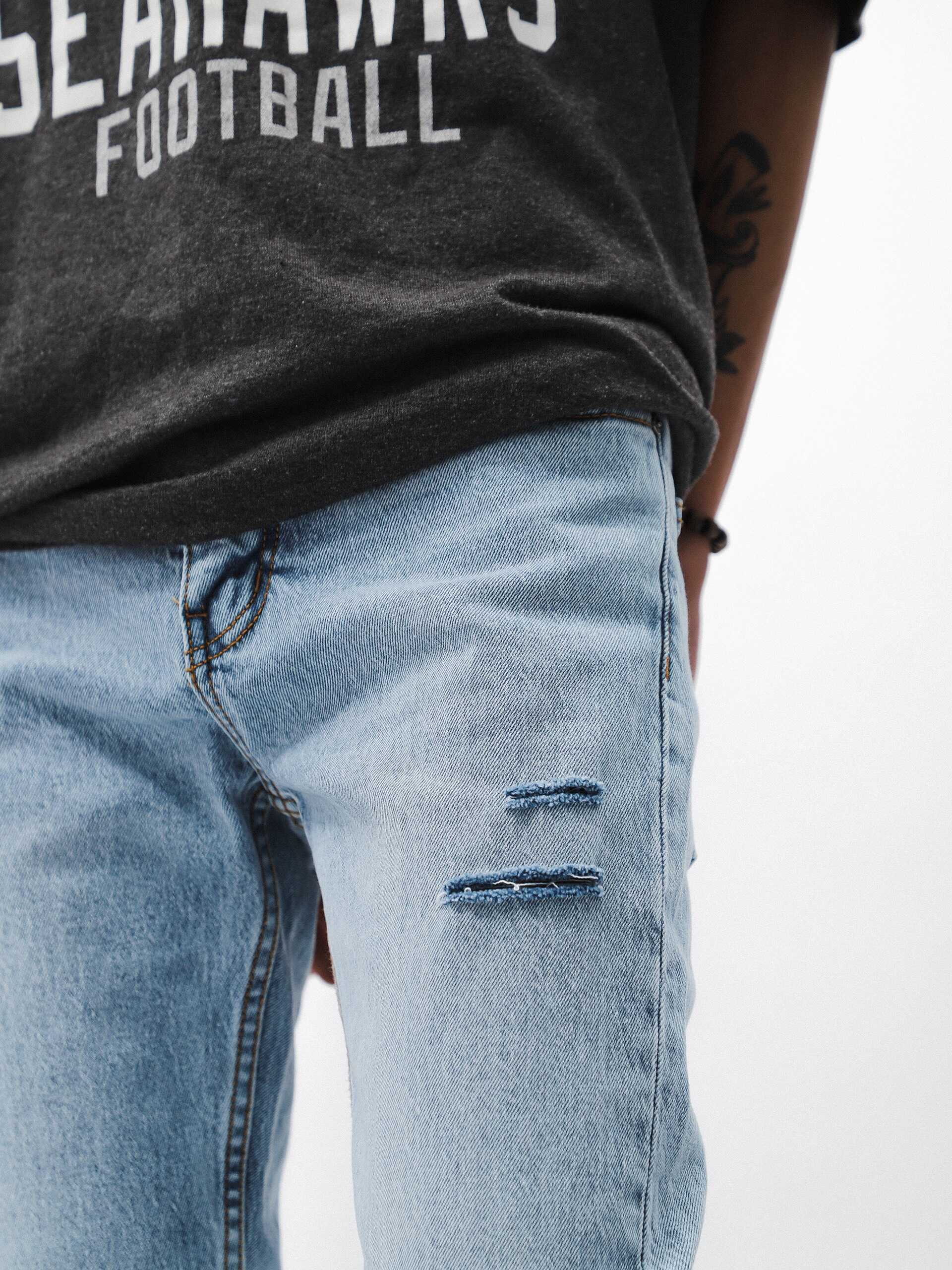 QUẦN JEANS DEFOXX XANH NHẠT RÁCH