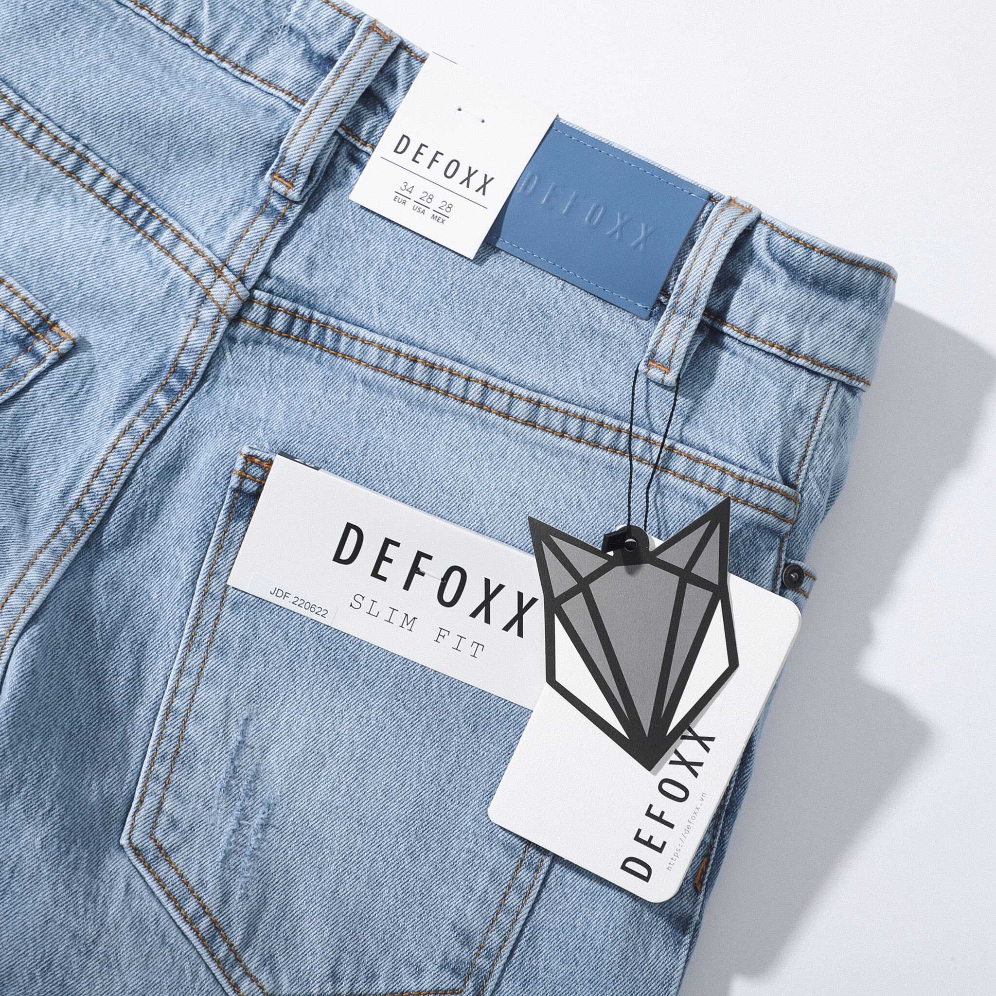 QUẦN JEANS DEFOXX XANH NHẠT RÁCH
