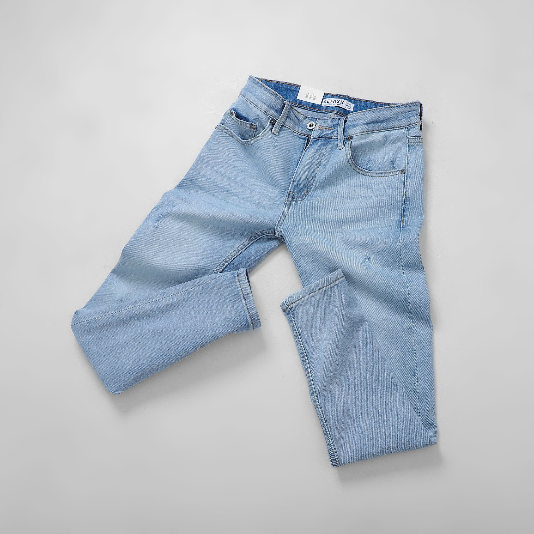 QUẦN JEANS DEFOXX XANH NHẠT CÀO RÁCH