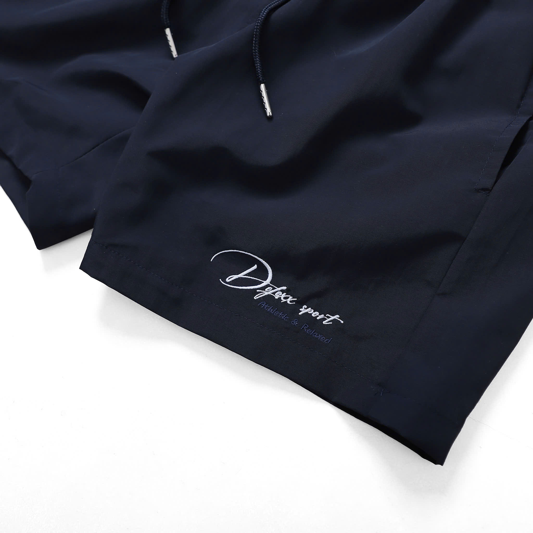 QUẦN ĐÙI DFS XI NHĂN THÊU