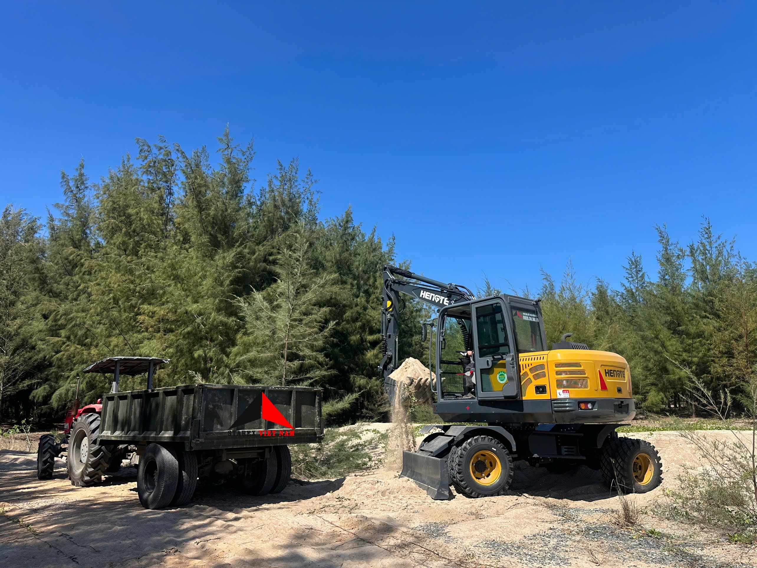 ban-giao-xe-dao-lop-03-hengte-ht80w-plus-2026-ve-du-an-xay-dung-khu-sinh-thai-o-