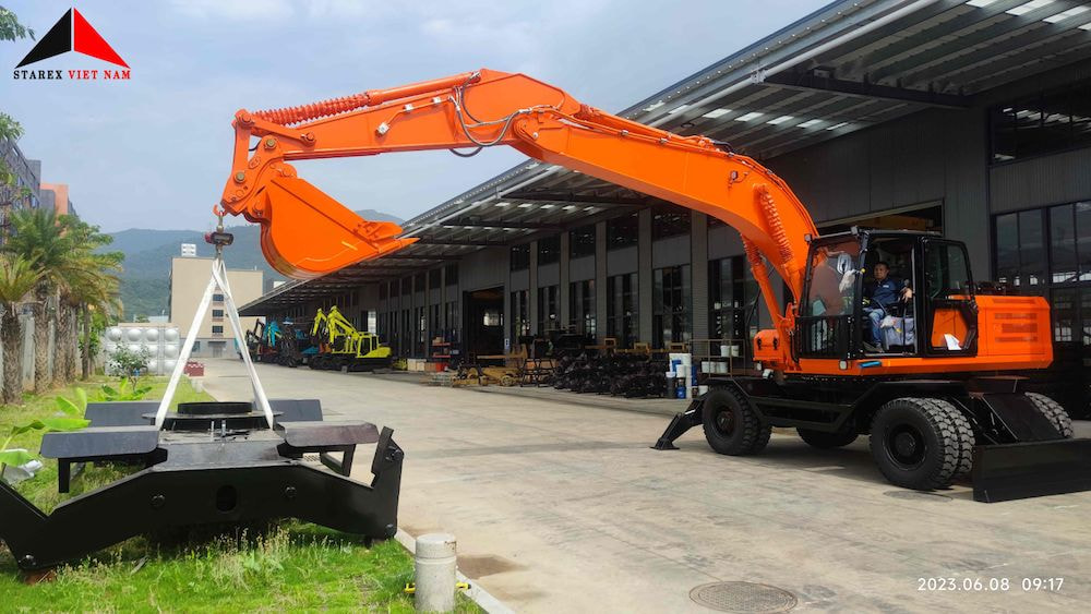 Máy xúc bánh lốp có thiết kế bánh xe di chuyển bằng lốp