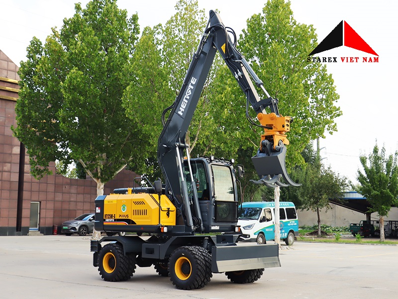 Máy xúc đào 04 bánh lốp Hengte HT120W
