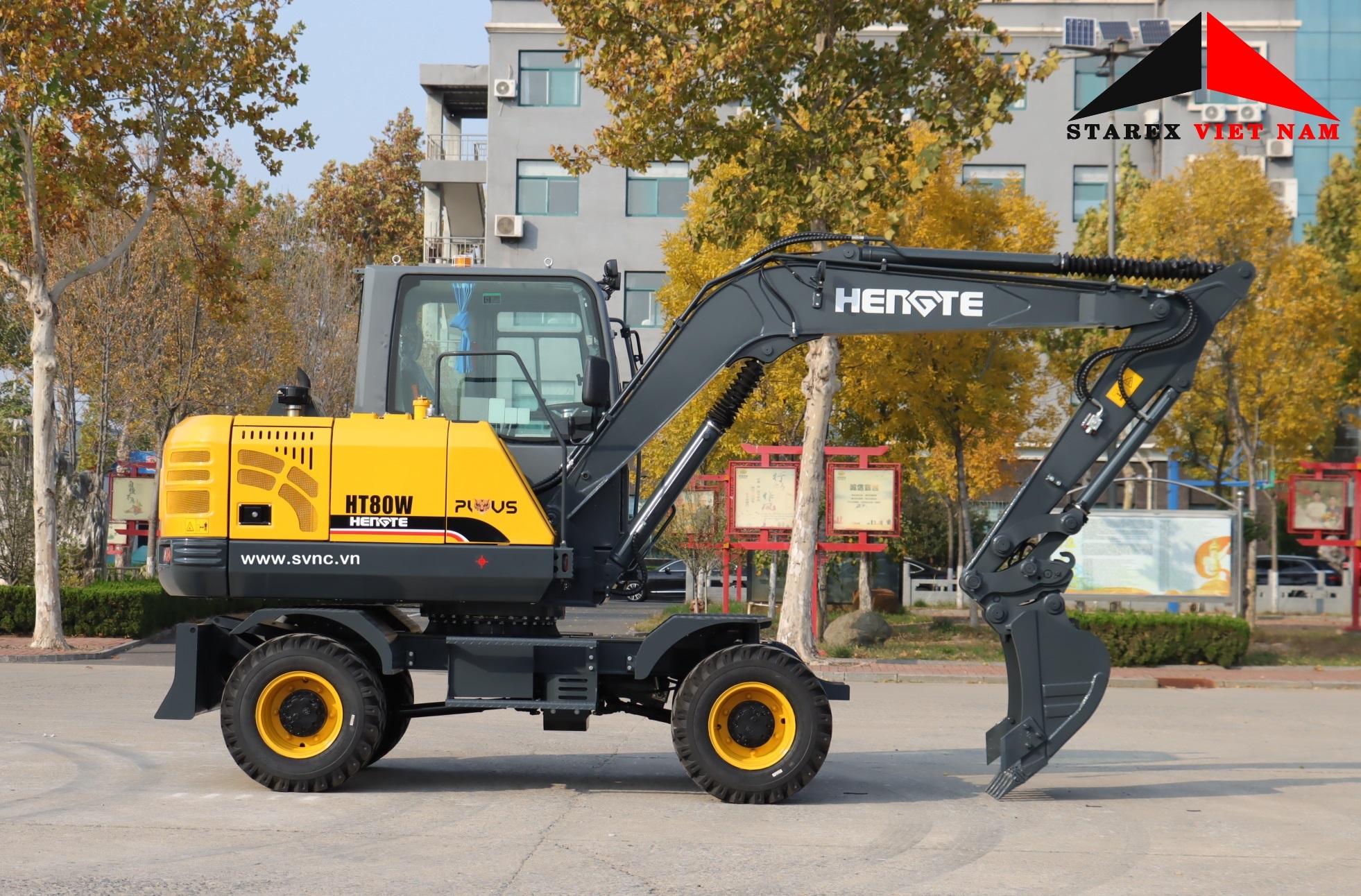 Máy xúc đào 03 bánh lốp Hengte HT80W