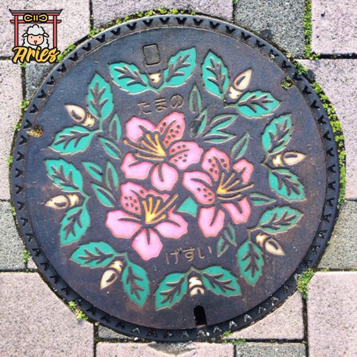 Trang trí nắp cống Nhật Bản – Nghệ thuật dưới những gót giày