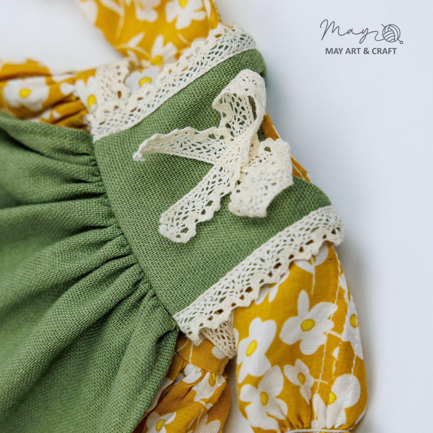 Váy yếm xanh phối ren