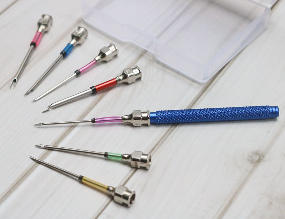 Kim thêu nổi cán kim loại