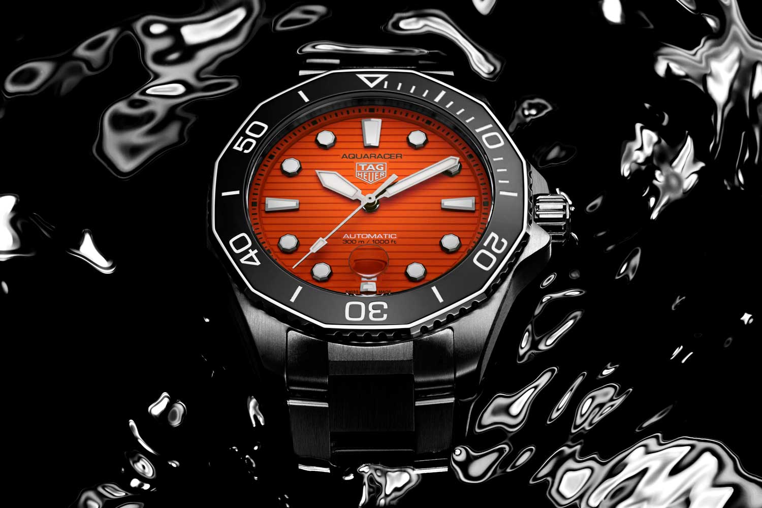 TAG Heuer Aquaracer Professional 300 Orange Diver và TAG Heuer Monaco