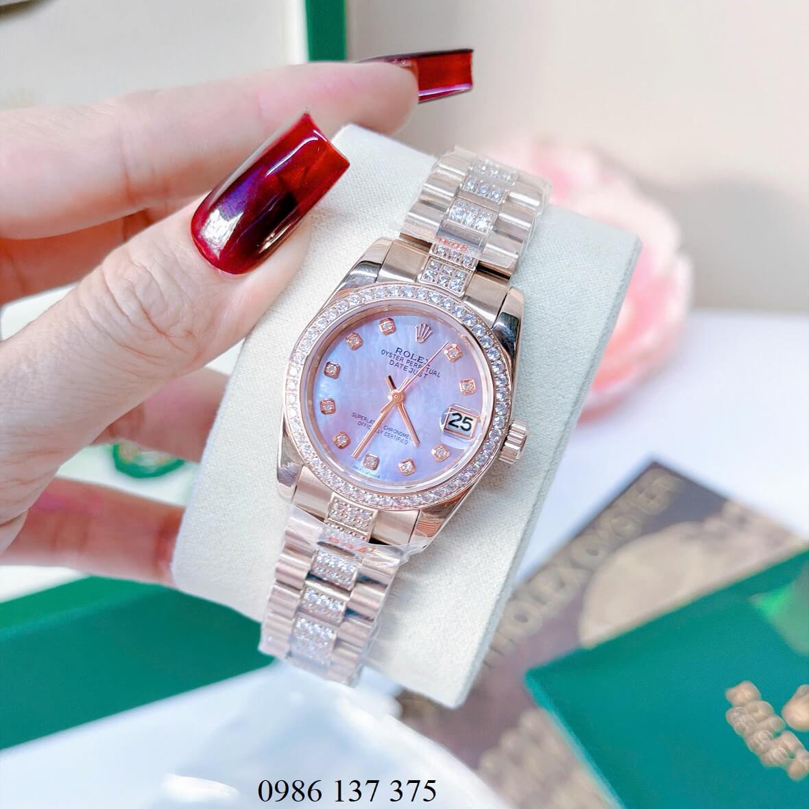 Đồng Hồ Nữ Rolex Datejust Viền Đá Mặt Xanh Xà Cừ Dây Kim Loại Vàng Hồng Đính Đá Size 31mm