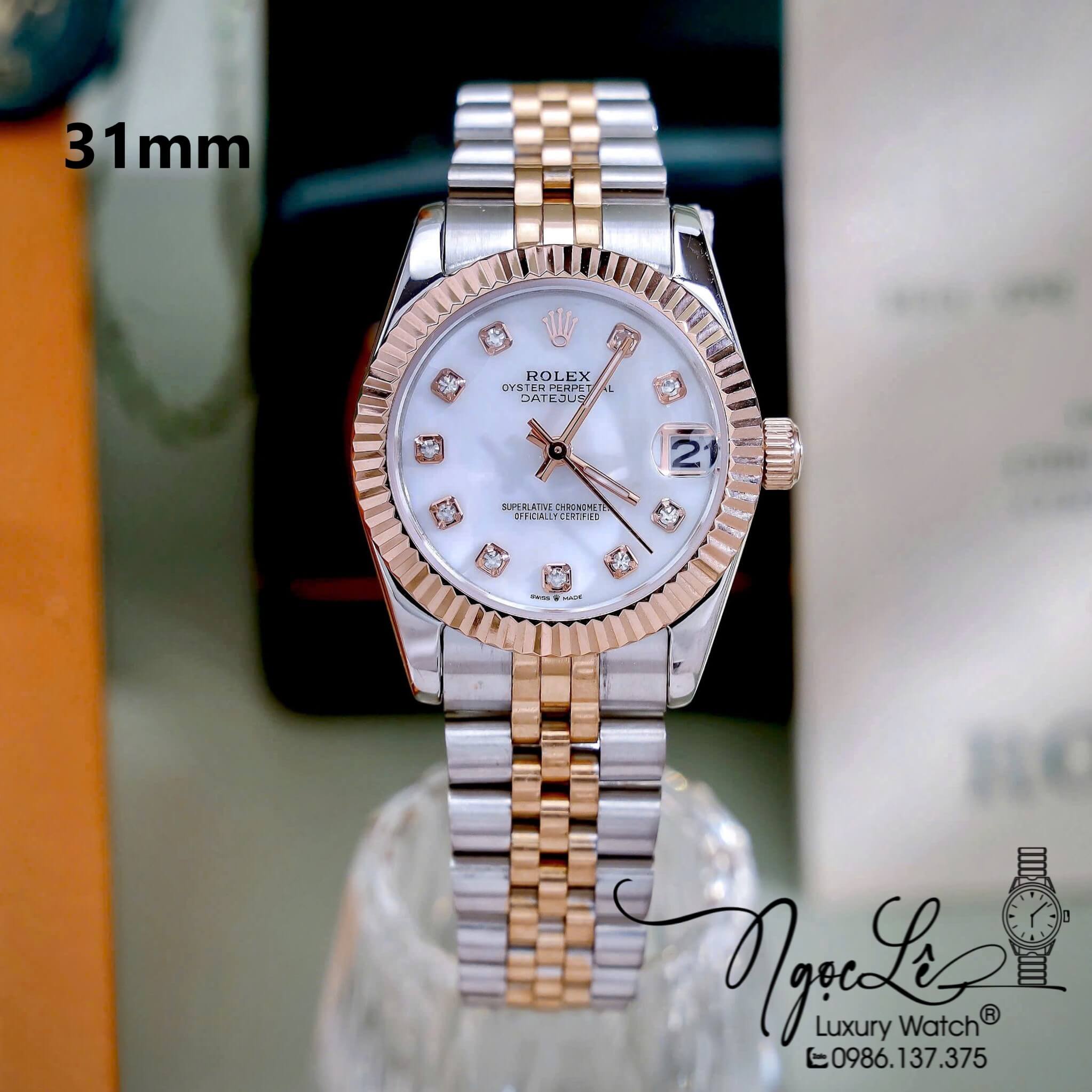 Đồng Hồ Nữ Rolex Datejust Máy Pin Dây Demi Rose Mặt Trắng Xà Cừ Niềng Khía Size 31mm
