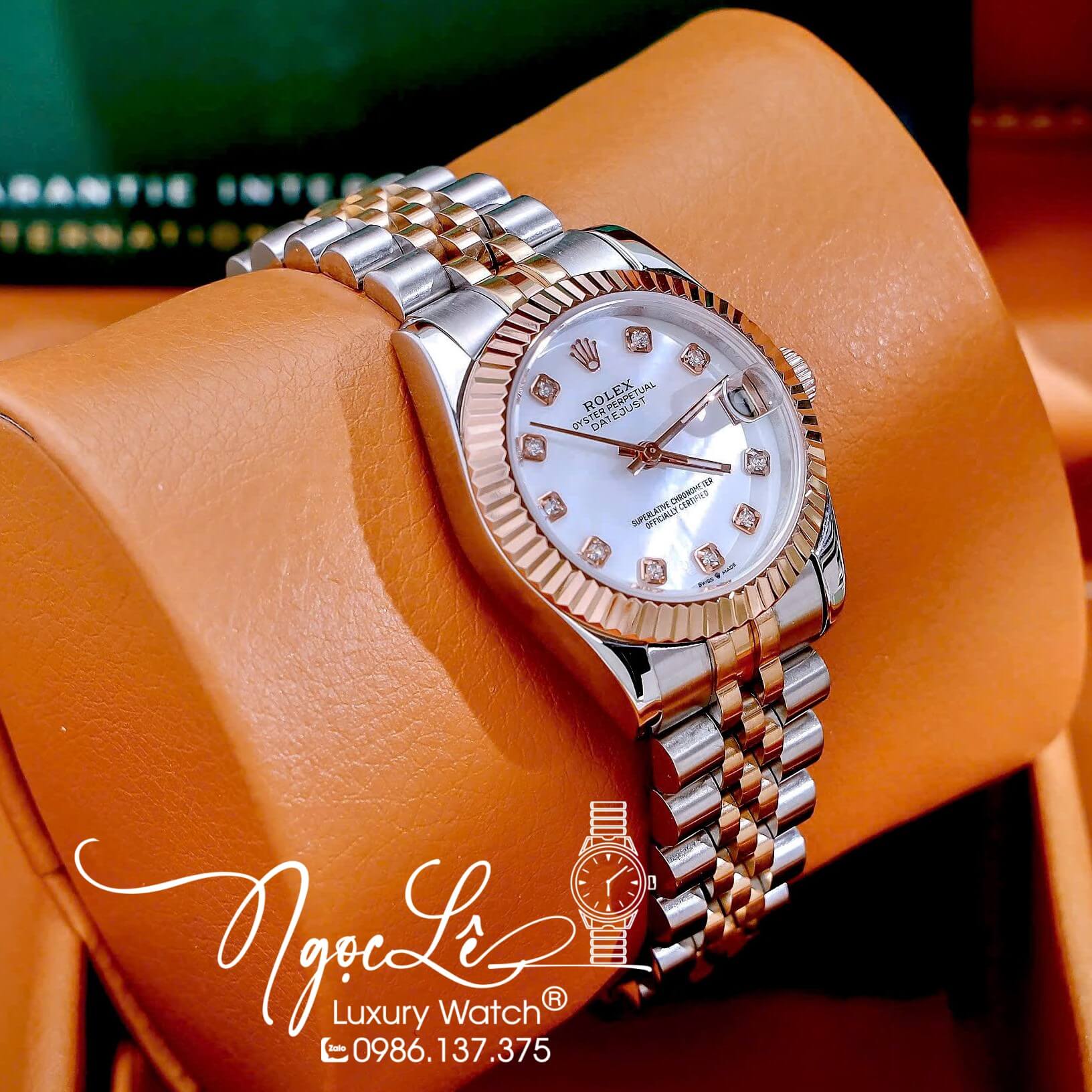 Đồng Hồ Nữ Rolex Datejust Máy Pin Dây Demi Rose Mặt Trắng Xà Cừ Niềng Khía Size 31mm