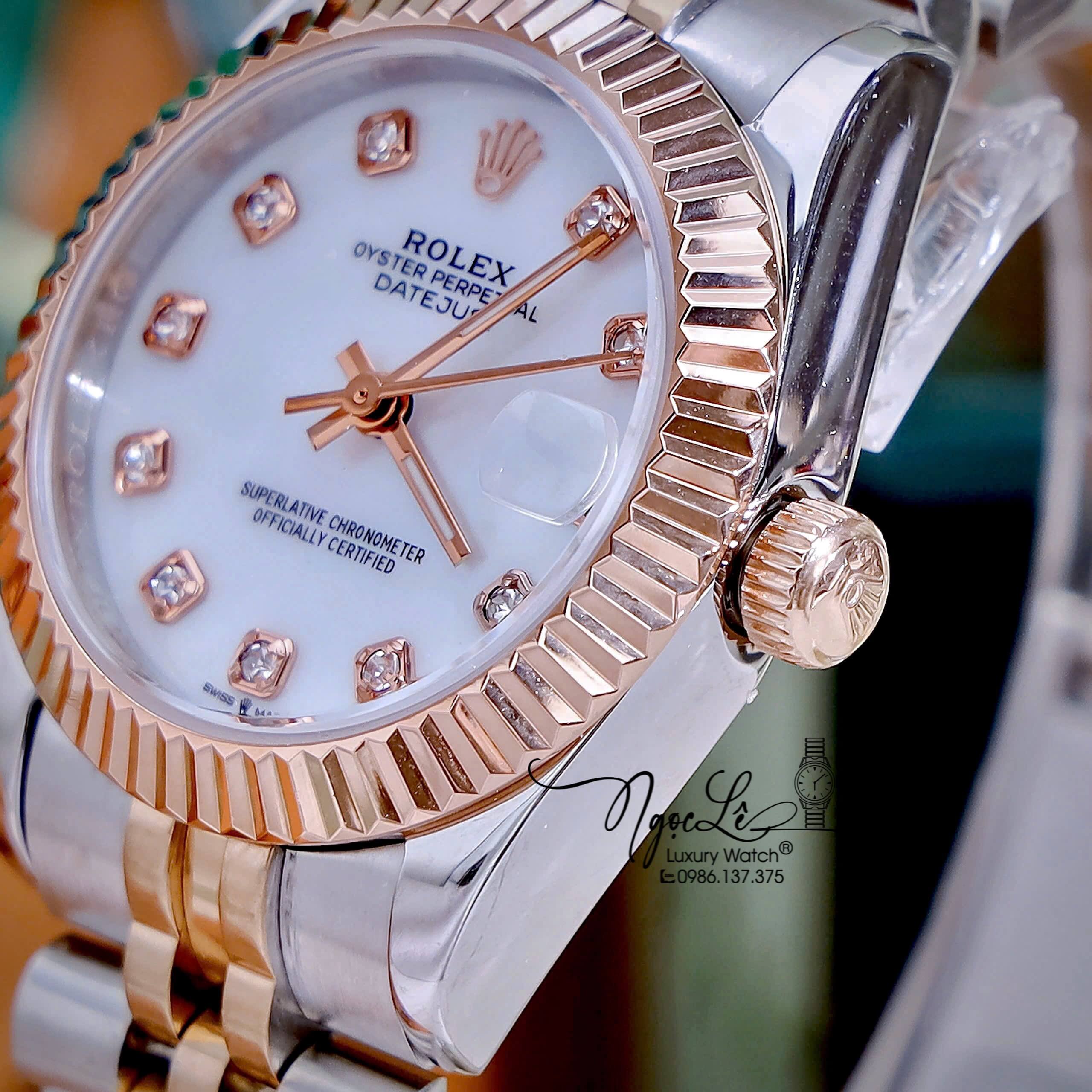 Đồng Hồ Nữ Rolex Datejust Máy Pin Dây Demi Rose Mặt Trắng Xà Cừ Niềng Khía Size 31mm