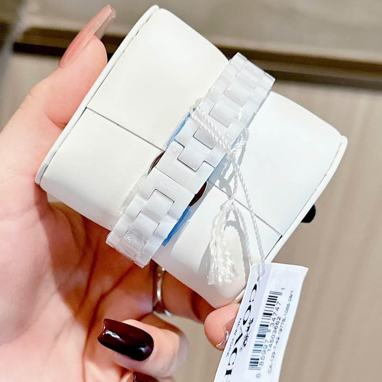 Đồng Hồ Nữ Coach Ceramic Trắng Viền Đá Mặt Họa Tiết Hoa Trà Size 33mm Vỏ Silver Quartz