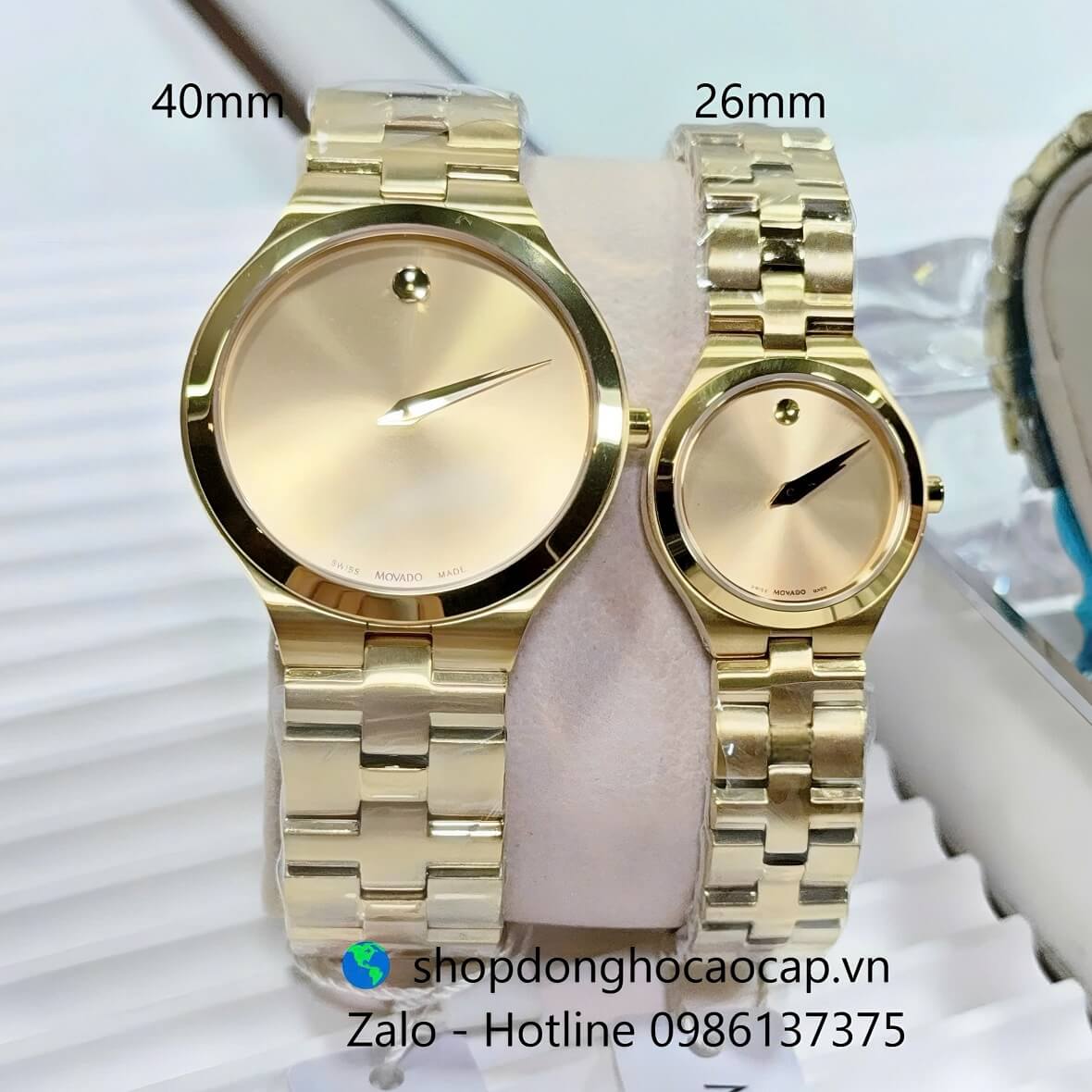 Đồng Hồ Cặp Movado Máy Pin Mặt Vàng Kim Loại Mạ Vàng Size 40mm - 26mm