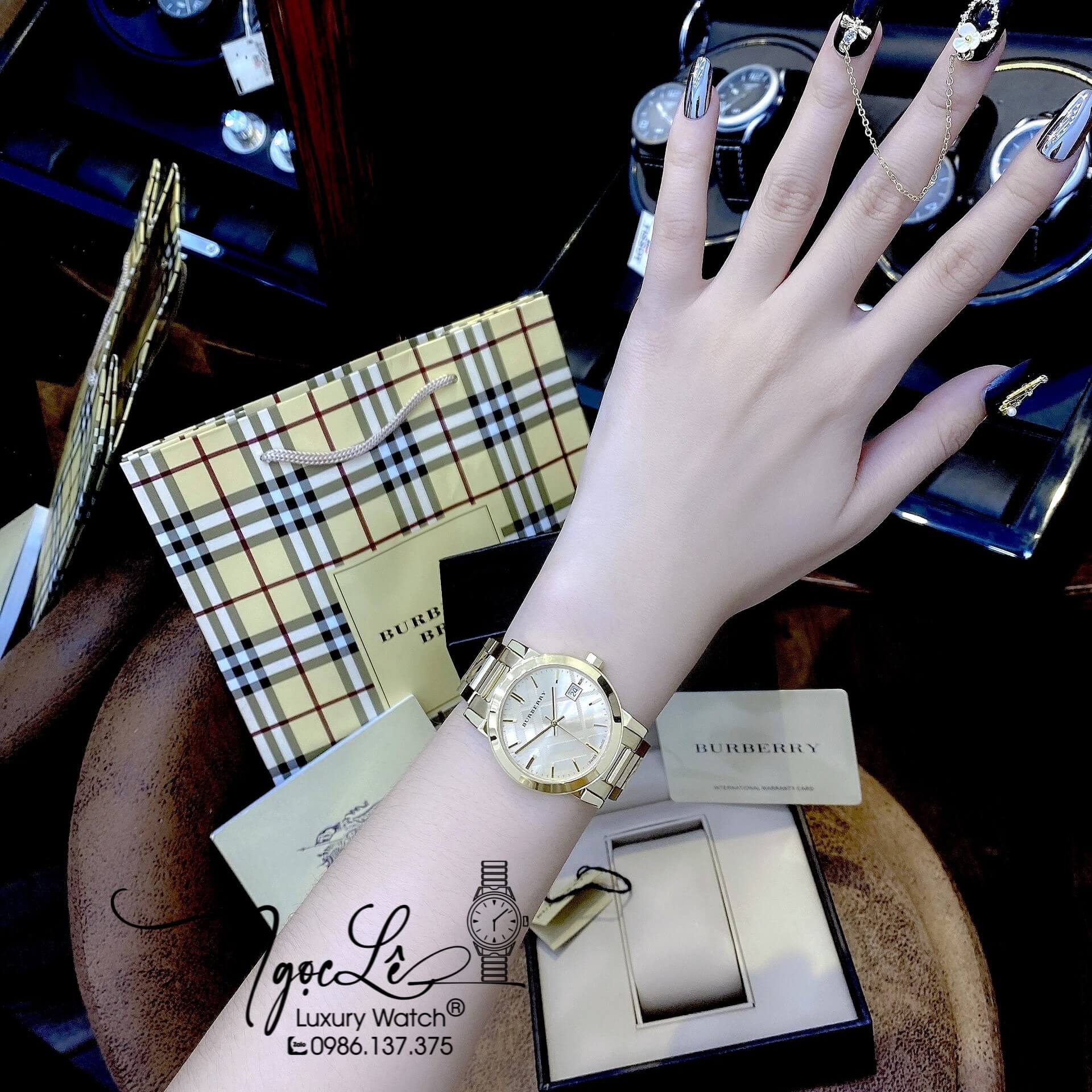 Đồng Hồ Cặp Burberry The City Dây Kim Loại Vàng Gold Size 34mm 38mm BU9038 BU9145