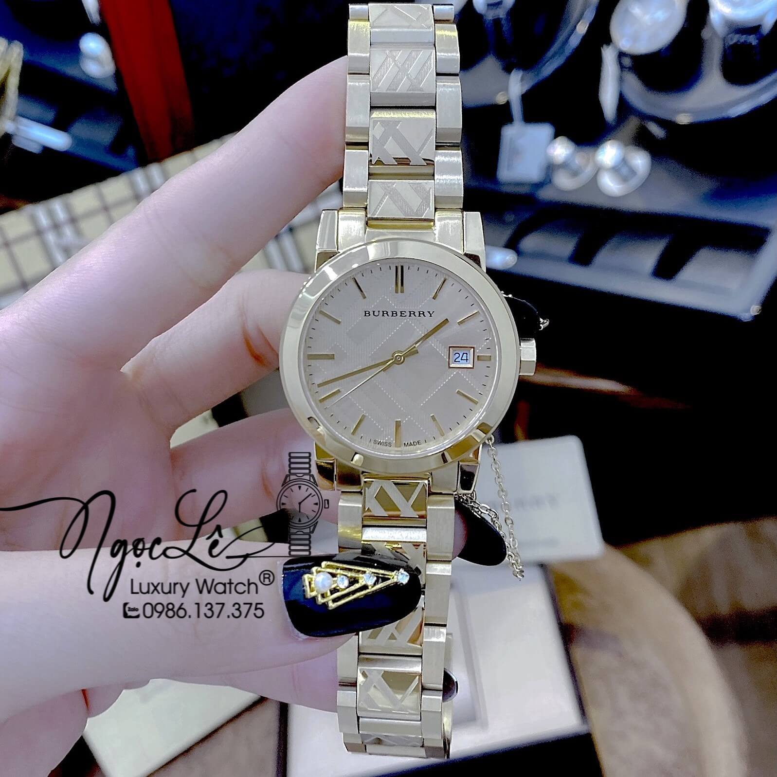 Đồng Hồ Cặp Burberry The City Dây Kim Loại Vàng Gold Size 34mm 38mm BU9038 BU9145