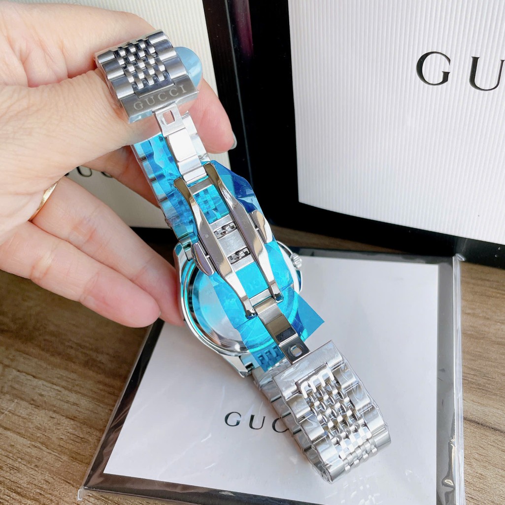 Đồng Hồ Nữ Gucci G-Timeless Dây Thép Silver Mặt Trắng Size 28mm