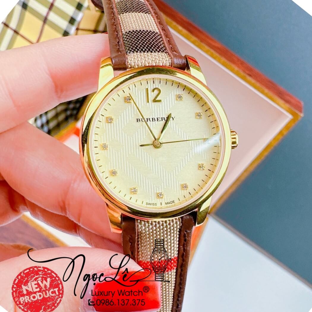 Đồng Hồ Burberry Nữ Dây Da Kẻ Sọc Caro Màu Nâu Mặt Vàng Size 32mm