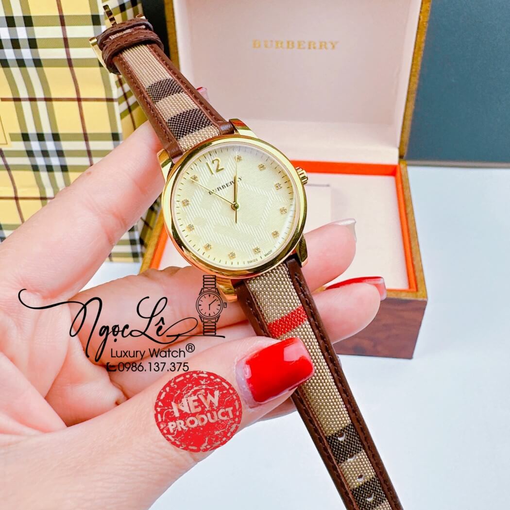 Đồng Hồ Burberry Nữ Dây Da Kẻ Sọc Caro Màu Nâu Mặt Vàng Size 32mm