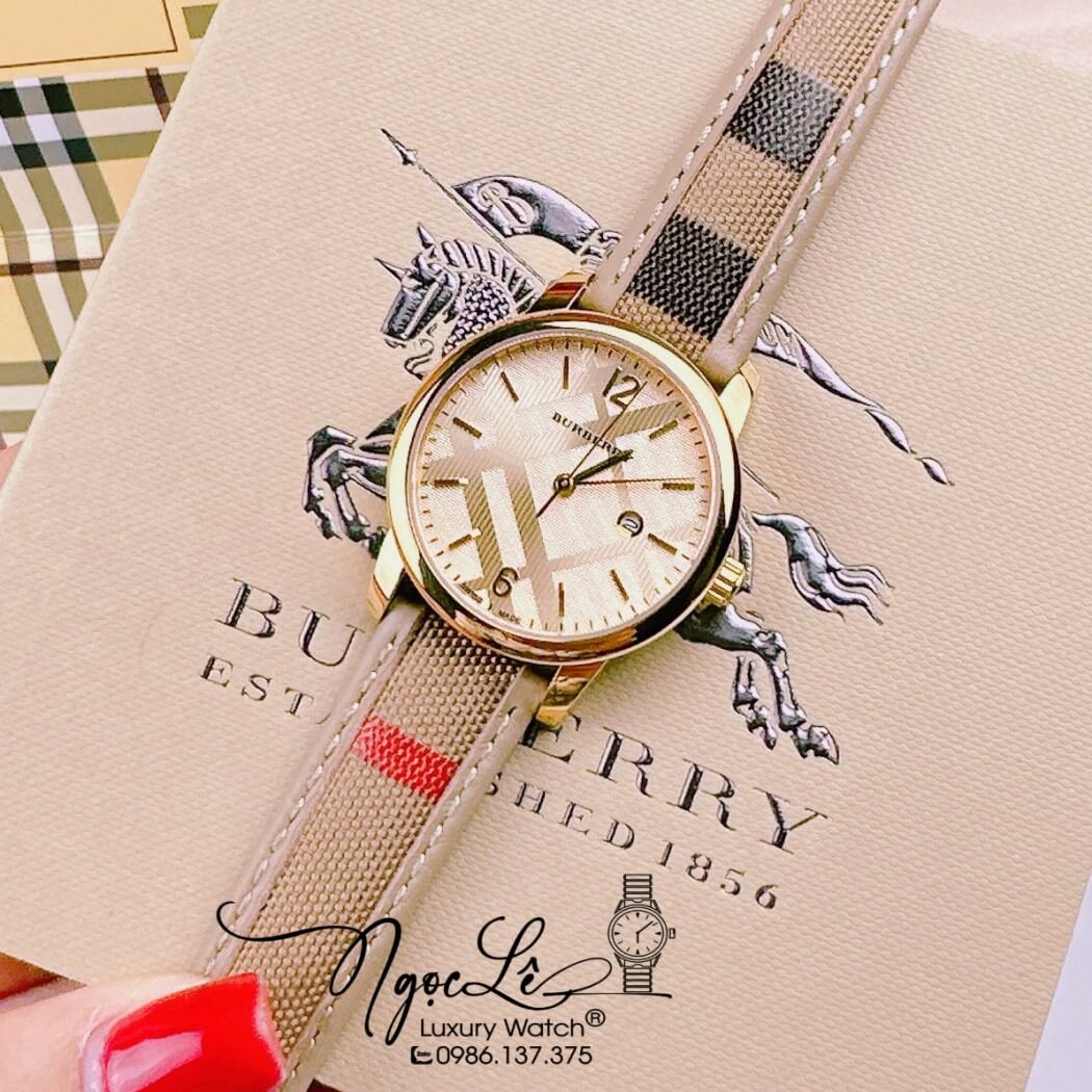 Đồng Hồ Burberry Nữ Dây Da Kẻ Sọc Caro Màu Nude Mặt Vàng Size 32mm