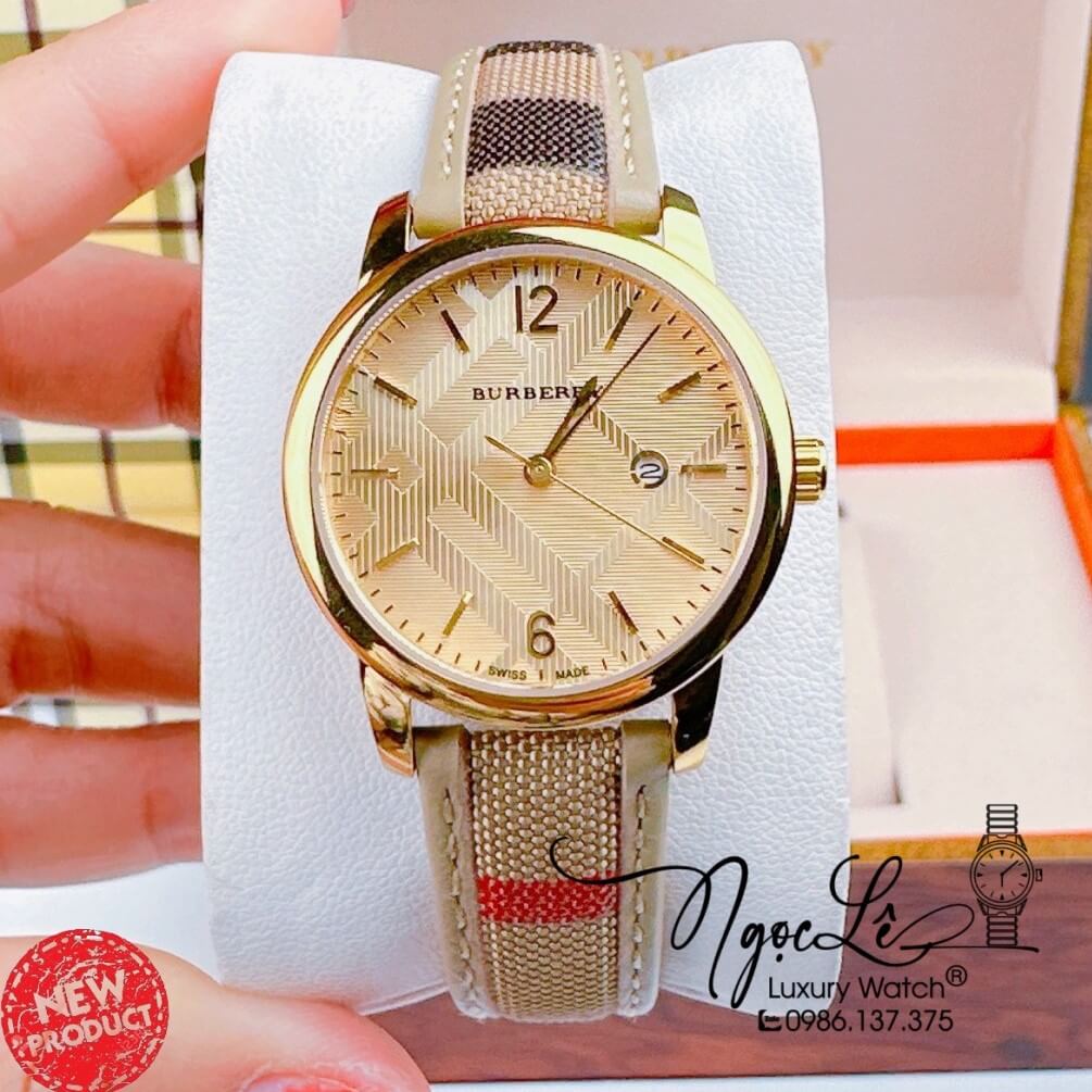 Đồng Hồ Burberry Nữ Dây Da Kẻ Sọc Caro Màu Nude Mặt Vàng Size 32mm