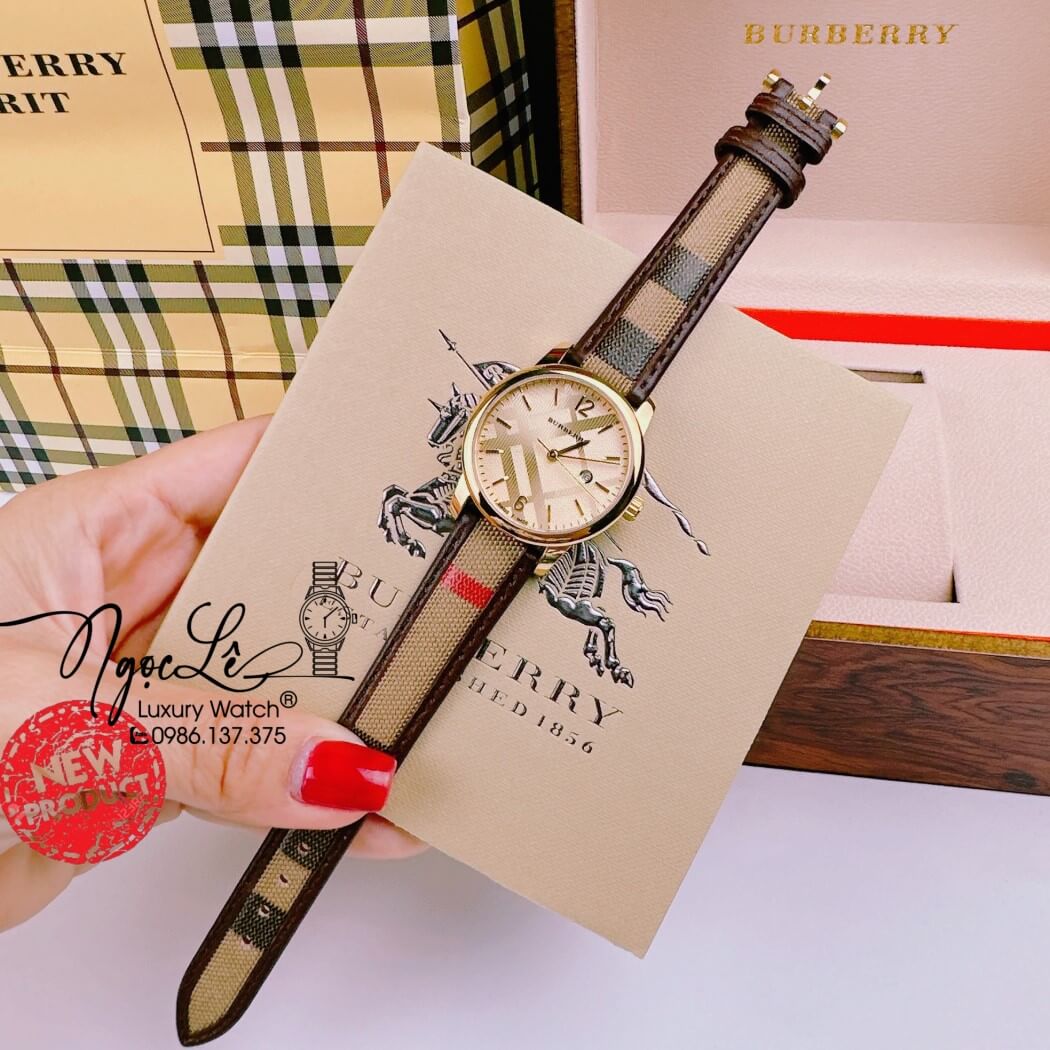 Đồng Hồ Burberry Nữ Dây Da Kẻ Sọc Caro Màu Nâu Mặt Vàng Size 32mm